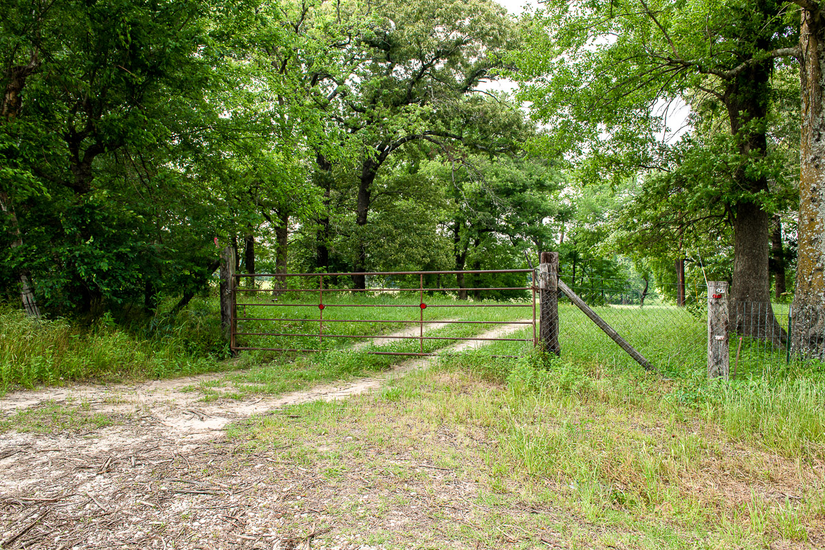 100 Acre Ranch with Year-Around Creek, Bass Pond and Barn | Simple Land Co