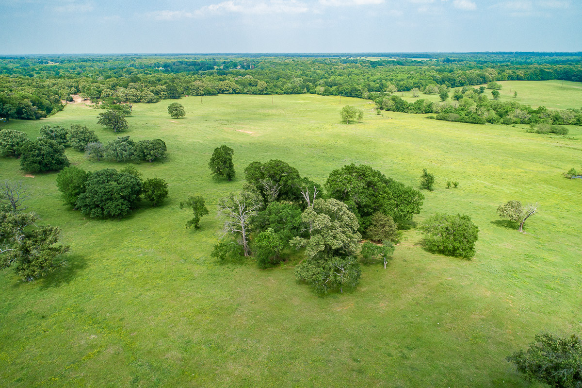 100 Acre Ranch with Year-Around Creek, Bass Pond and Barn | Simple Land Co