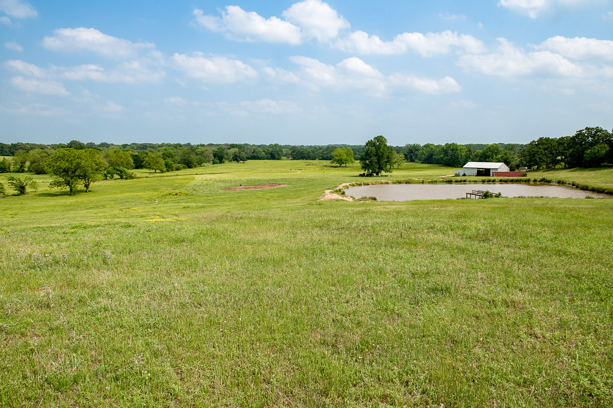 100 Acre Ranch with Year-Around Creek, Bass Pond and Barn | Simple Land Co