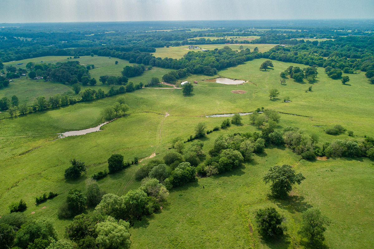 100 Acre Ranch with Year-Around Creek, Bass Pond and Barn | Simple Land Co