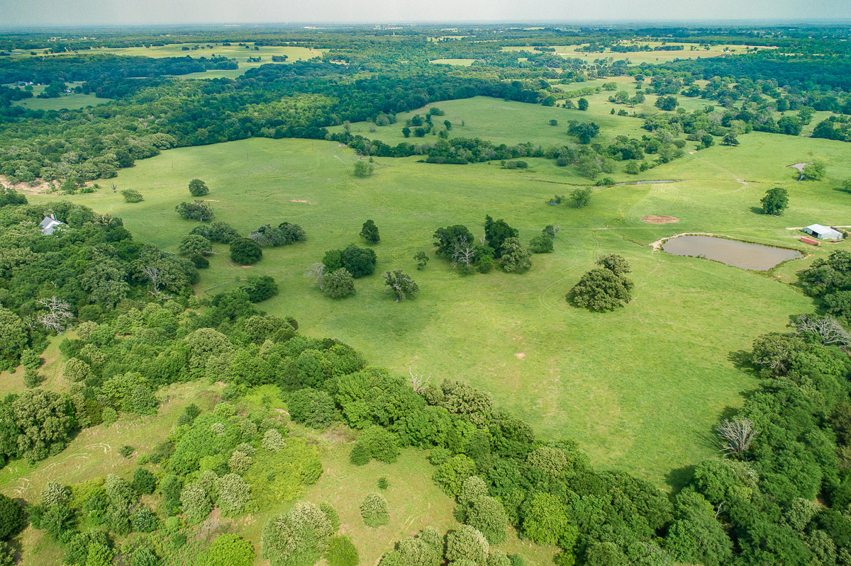 100 Acre Ranch with Year-Around Creek, Bass Pond and Barn | Simple Land Co